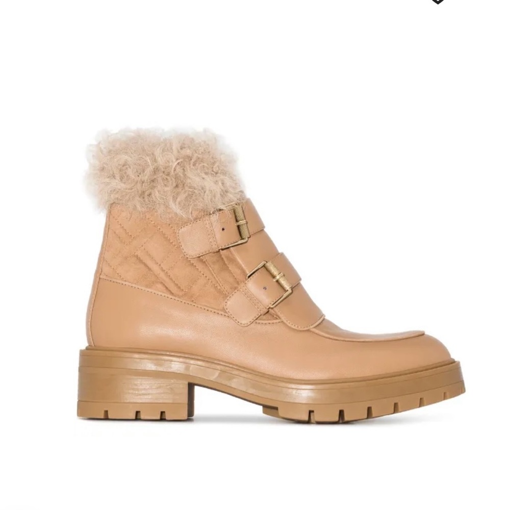 Aquazzura
Ryan faux-fur buckle-strap boots